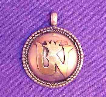Tibetan Om Pendants or amulets
